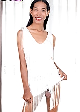 In this solo set, ladyboy Lee strips from her dress, plays with her big tits and strokes her big cock just for you