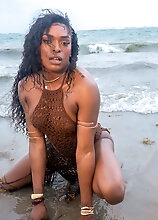 Black tgirl Naomi Whistledown likes to walk out to the beach. Then she comes home and plays with her big cock