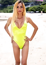 Slim ladyboy Pat loves to walk on the beach in colorful swimwear. Then she went to her room and play with her cock in the jacuzzi