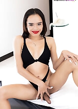 In this hot solo scene, ladyboy Da showcases her perky breasts and strokes her cock until she releases a thick, creamy load onto her belly
